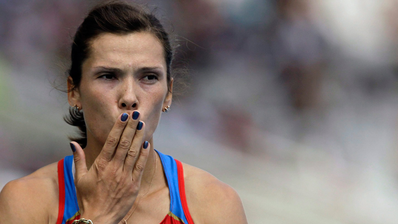 Russia's-Anastasia-Kapachinskaya-blows-a-kiss-after-a-Women's-200m-heat-during-the-European-Athletics-Championships,-in-Barcelona,-Spain.-Fourteen-Russian-athletes-who-competed-in-the-2008-Beijing-Olympics,-including-10-medalists-and-2012-high-jump-champion-Anna-Chicherova,-tested-positive-in-the-reanalysis-of-their-doping-samples,-state-television-reported-Tuesday,-May-24,-2016.-Silver-medal-winners-whose-doping-retests-reportedly-came-back-positive-are-javelin-thrower-Maria-Abakumova,-4x400-relay-runners-Anastasia-Kapachinskaya-and-Tatiana-Firova-and-weightlifter-Maria-Shainova,-the-report-said.(Anja-Niedringhaus/AP)