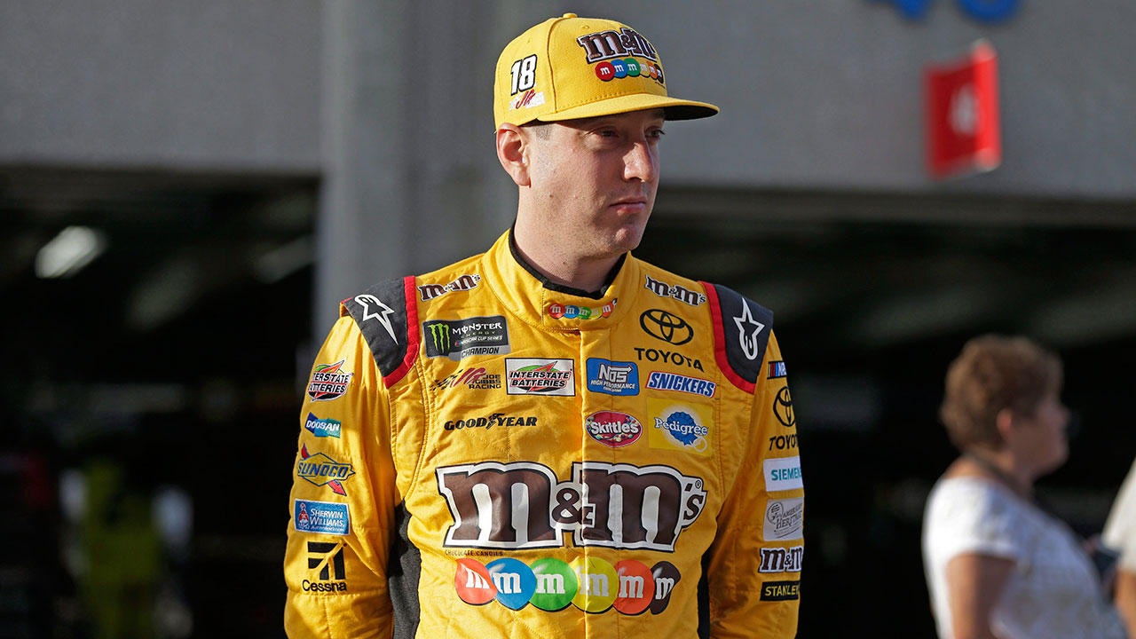 Kyle-Busch-waits-for-his-car-to-pass-inspection-before-qualifying-for-Sunday's-NASCAR-Cup-series-auto-race-at-Charlotte-Motor-Speedway-in-Concord,-N.C.,-Thursday,-May-25,-2017.-(Chuck-Burton/AP)