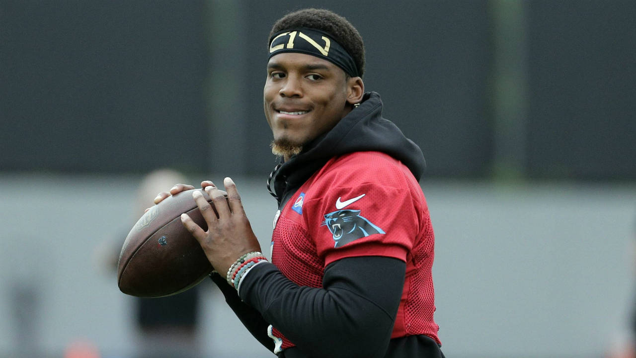 Carolina-Panthers-quarterback-Cam-Newton-(1)-runs-a-drill-during-practice-during-the-NFL-football-team's-organized-team-activities-in-Charlotte.-(Chuck-Burton/AP)