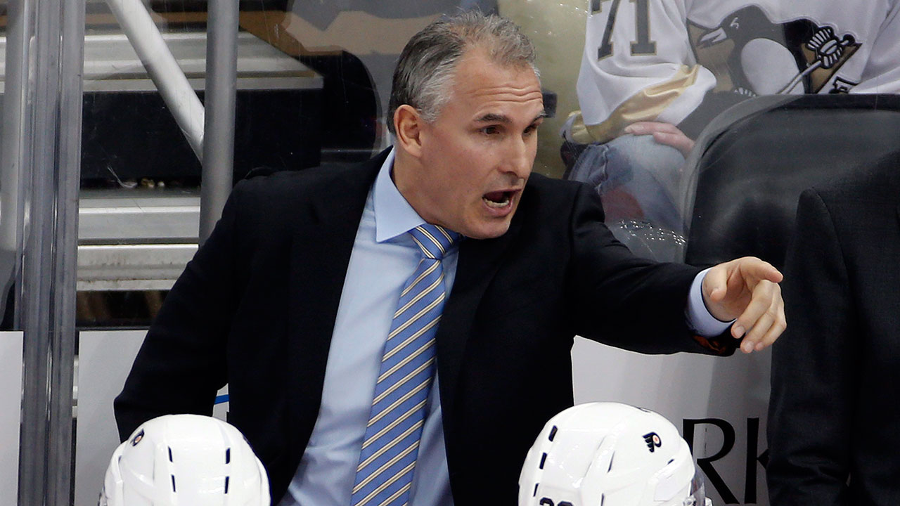 Philadelphia-Flyers-head-coach-Craig-Berube-gives-instructions-during-a-time-out-in-the-third-period-of-an-NHL-hockey-game-against-the-Pittsburgh-Penguins-in-Pittsburgh.-The-Flyers-fired-Berube-on-Friday,-April-17,-2015.-(Gene-J.-Puskar/AP)
