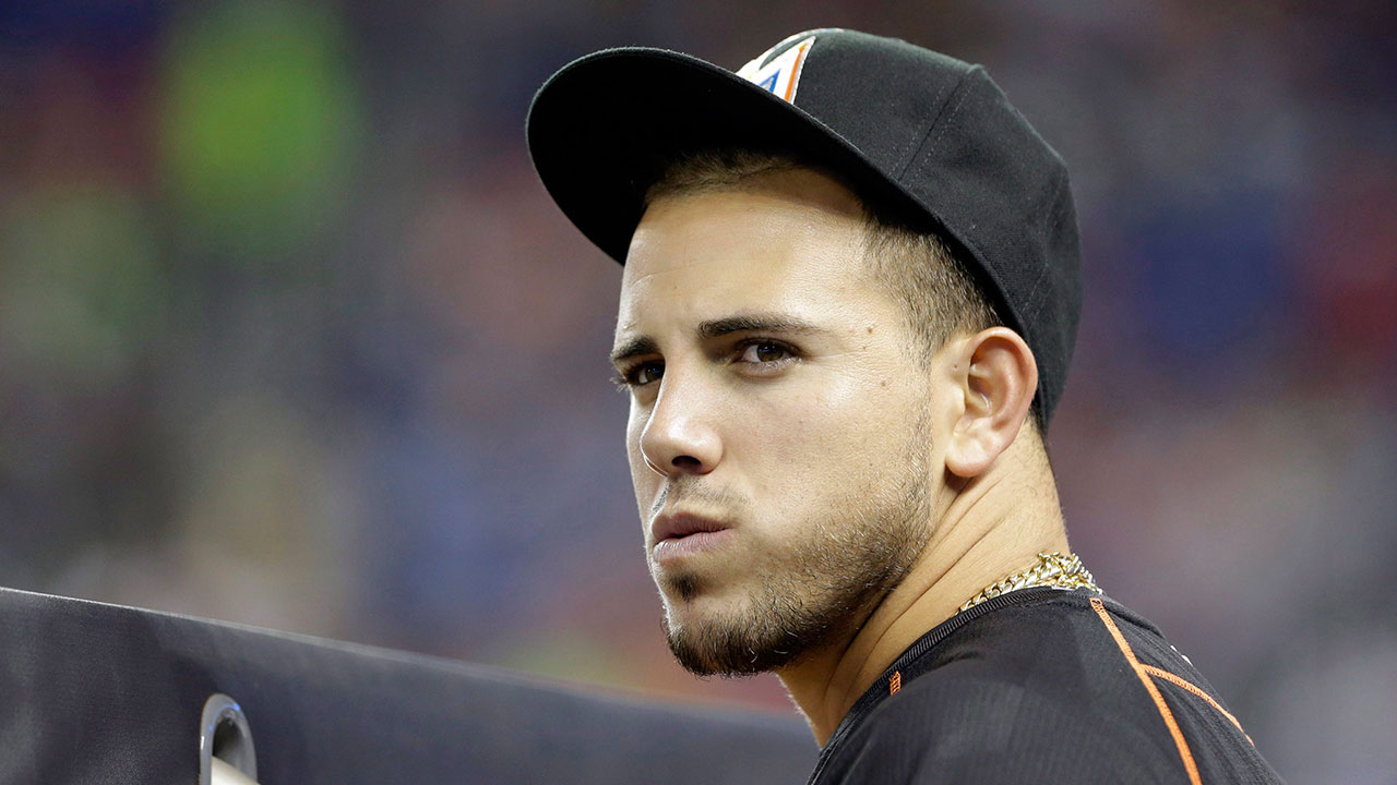 Miami-Marlins-pitcher-Jose-Fernandez-stands-in-the-dugout-before-the-start-of-a-baseball-game-against-the-St.-Louis-Cardinals-in-Miami.-The-families-of-the-two-men-who-were-with-Fernandez-when-his-boat-crashed-into-a-Miami-Beach-jetty,-killing-all-three-,-are-suing-the-All-Star's-estate.-Attorney-Christopher-Royer,-who-is-representing-the-families-of-25-year-old-Eduardo-Rivero-and-27-year-old-Emilio-Jesus-Macias,-told-the-Sun-Sentinel-that-Rivero's-claim-was-filed-Friday,-Feb.-10,-2017-and-Macias'-will-be-filed-Monday.-Each-family-is-seeking-$2-million.-(Wilfredo-Lee/AP)