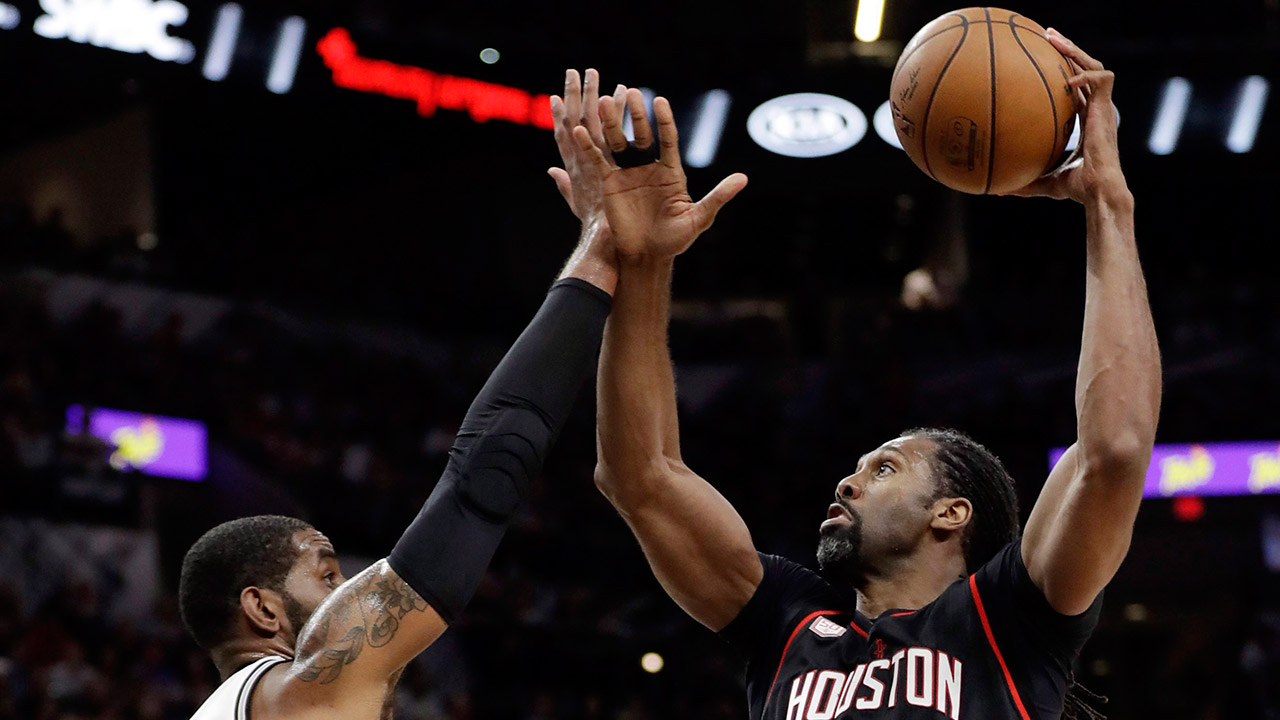 San-Antonio-Spurs'-LaMarcus-Aldridge-(12)-guards-against-a-shot-by-Houston-Rockets'-Nene-Hilario-(42)-during-the-first-half-of-Game-2-in-a-second-round-NBA-basketball-playoff-series,-Wednesday,-May-3,-2017,-in-San-Antonio.-(Eric-Gay/AP)