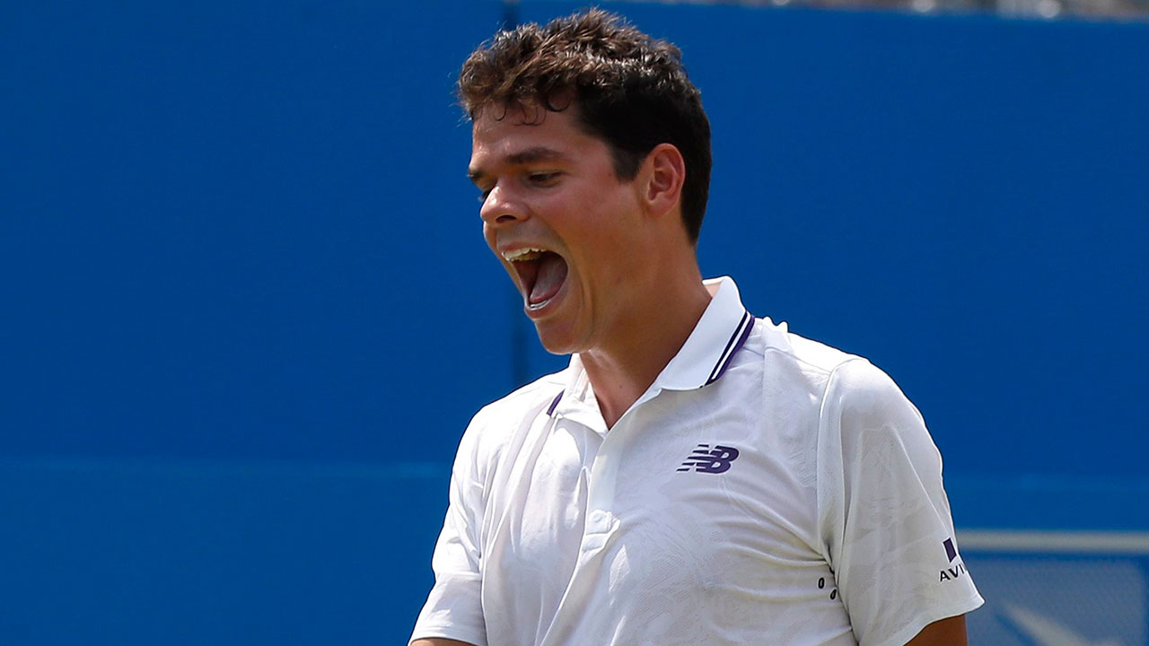 Milos-Raonic-of-Canada-shouts-after-he-plays-a-return-to-Thanasi-Kokkinakis-of-Australia-during-day-two-of-the-Queen's-Club-tennis-tournament-in-London,-Tuesday,-June-20,-2017.-(Kirsty-Wigglesworth/AP)