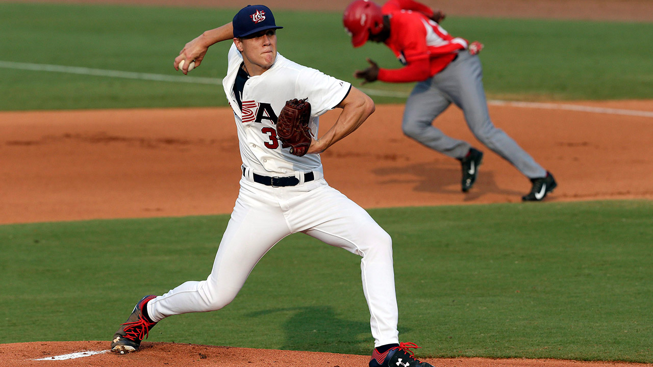 U.S.-collegiate-team-pitcher-Tanner-Houck-winds-up-during-the-first-inning-of-a-baseball-game-against-Cuba-in-Cary,-N.C.,-Monday,-July-6,-2015.-(-Gerry-Broome/AP)