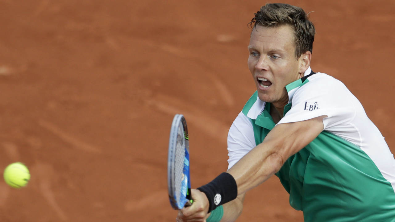 Tomas-Berdych-of-the-Czech-Republic-plays-a-shot-against-Germany's-Jan-Lennard-Struff-during-their-first-round-match-of-the-French-Open-tennis-tournament-at-the-Roland-Garros-stadium,-in-Paris,-France.-Tuesday,-May-30,-2017.-(Petr-David-Josek/AP)