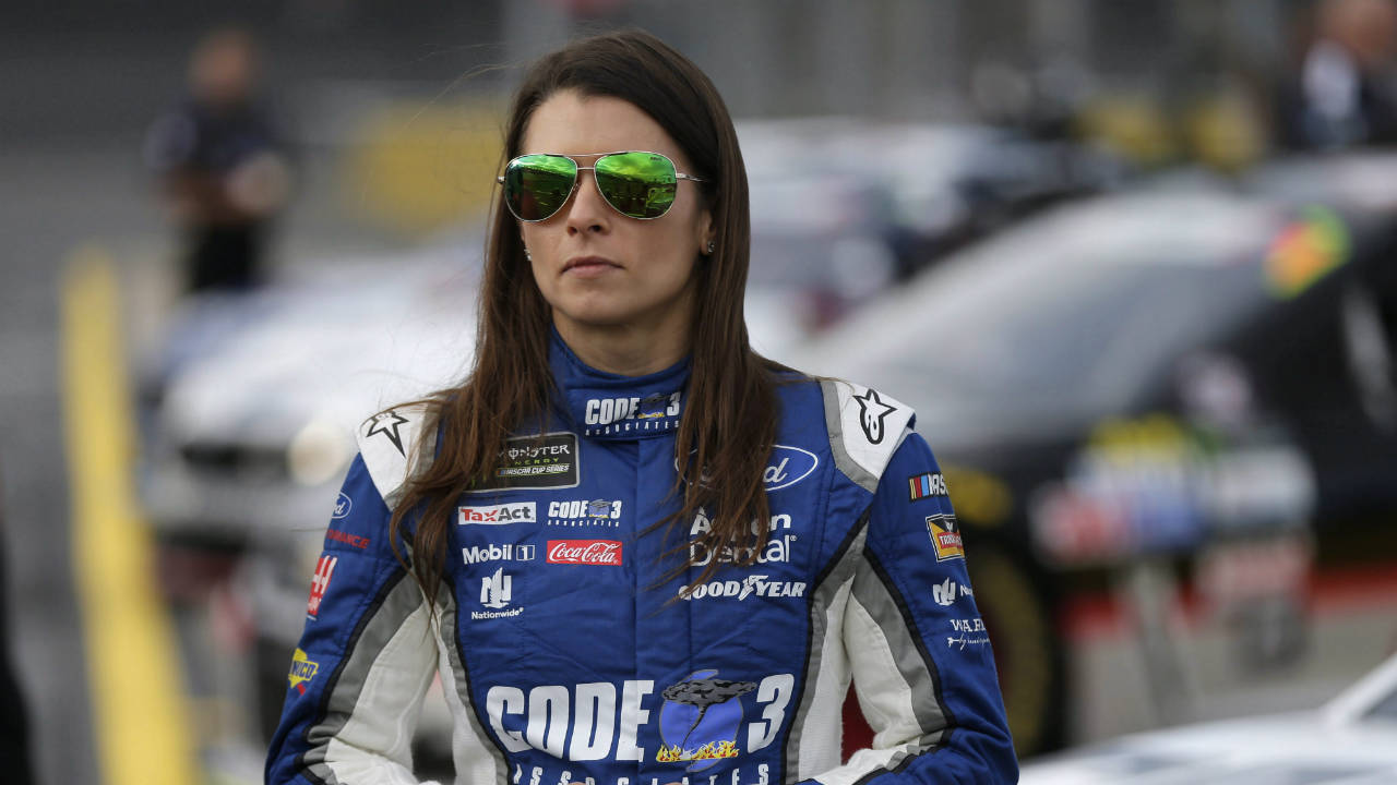 Danica-Patrick-stands-by-her-car-before-qualifying-for-Sunday's-NASCAR-Cup-series-auto-race-at-Charlotte-Motor-Speedway-in-Concord,-N.C.,-Thursday,-May-25,-2017.-(Chuck-Burton/AP)
