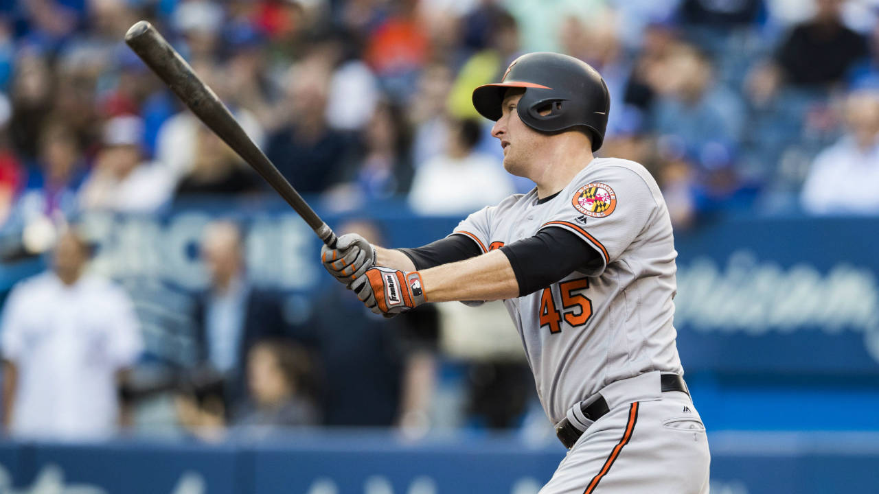 Baltimore-Orioles'-Mark-Trumbo-hits-a-two-RBI-double-during-the-first-inning-of-MLB-baseball-action-against-the-Toronto-Blue-Jays,-in-Toronto,-Tuesday-June-27,-2017.-(Mark-Blinch/CP)
