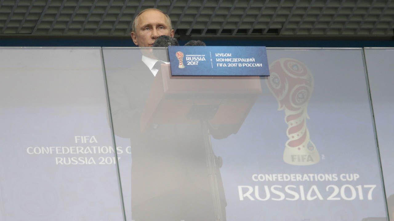 Russian-President-Vladimir-Putin-speaks-prior-to-the-Confederations-Cup,-Group-A-soccer-match-between-Russia-and-New-Zealand,-at-the-St.-Petersburg-Stadium,-Russia,-Saturday,-June-17,-2017.-(Ivan-Sekretarev/AP)