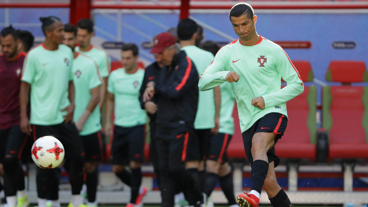 Portugal's-Cristiano-Ronaldo-exercises-during-a-training-session-at-the-Arena-in-Kazan,-Russia,-on-Saturday,-June-17,-2017.-Portugal-will-play-Mexico-in-a-Confederations-Cup,-Group-A-soccer-match-scheduled-for-Sunday,-June-18,-2017.-(Sergei-Grits/AP)
