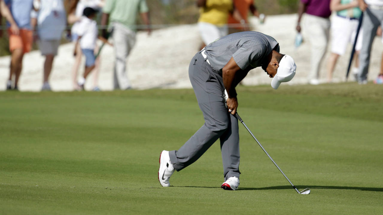 In-this-Dec.-3,-2016,-file-photo,-Tiger-Woods-reacts-after-hitting-from-the-fairway-during-the-third-round-at-the-Hero-World-Challenge-golf-tournament,-in-Nassau,-Bahamas.-Police-say-golf-great-Tiger-Woods-has-been-arrested-on-a-DUI-charge-in-Florida.-The-Palm-Beach-County-Sheriff's-Office-says-on-its-website-that-Woods-was-booked-into-a-county-jail-around-7-a.m.-on-Monday,-May-29,-2017.-(Lynne-Sladky,-File/AP)