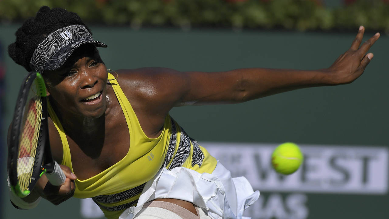 In-this-March-13,-2017,-file-photo,-Venus-Williams-returns-a-shot-to-Lucie-Safarova-at-the-BNP-Paribas-Open-tennis-tournament,-in-Indian-Wells,-Calif.-Venus-Williams-is-making-her-20th-Wimbledon-appearance.-(Mark-J.-Terrill,-File/AP)