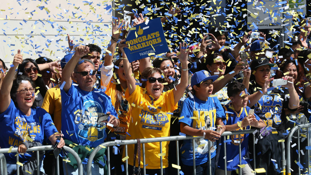 Golden-State-Warriors-fans-cheer-along-Broadway-during-the-team's-NBA-basketball-championship-victory-parade-in-downtown-Oakland,-Calif.,-on-Friday,-June-19,-2015.-(Jane-Tyska/The-Oakland-Tribune-via-AP)