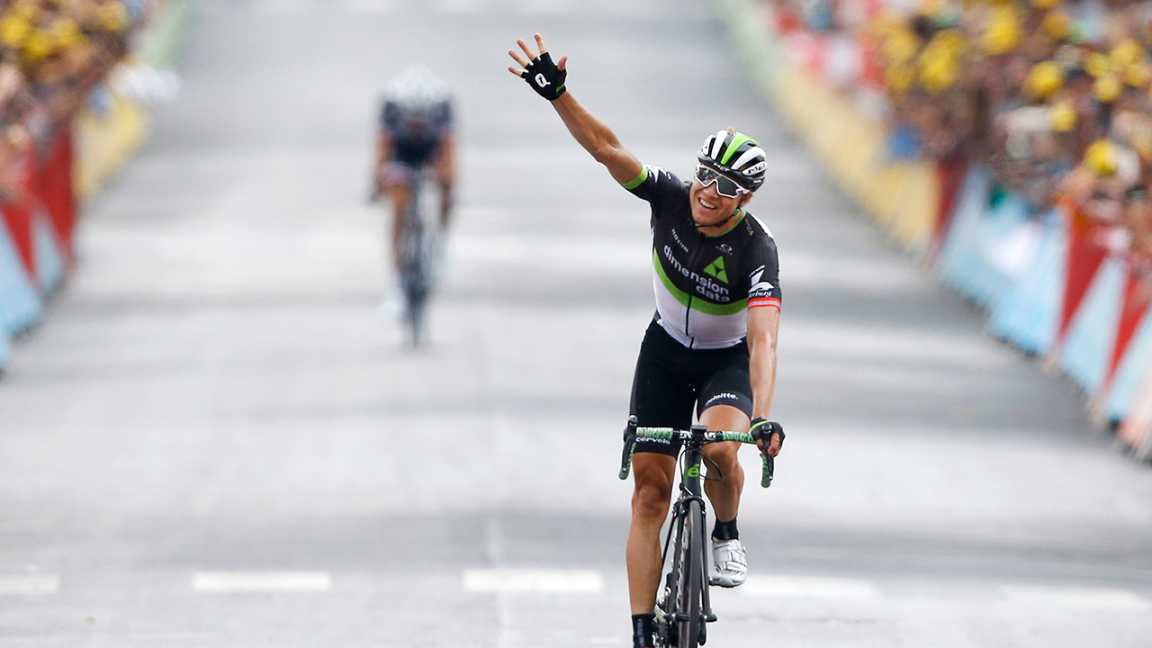 Norway's-Edvald-Boasson-Hagen-celebrates-as-he-crosses-the-finish-line-to-win-the-nineteenth-stage-of-the-Tour-de-France.-(Peter-Dejong/AP)