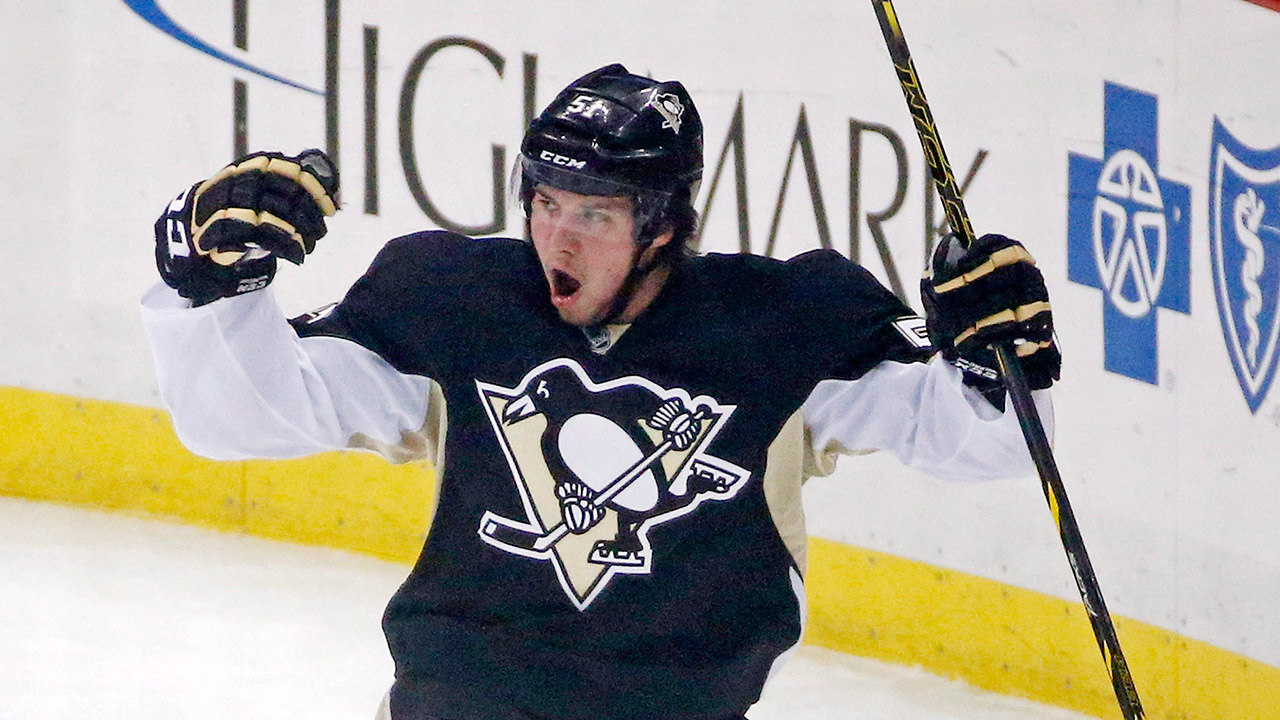 Pittsburgh-Penguins'-Derrick-Pouliot-celebrates-his-first-NHL-hockey-goal-during-the-first-period-of-a-game-against-the-Florida-Panthers-in-Pittsburgh,-Saturday,-Dec.-20,-2014.-(Gene-J.-Puskar/AP)