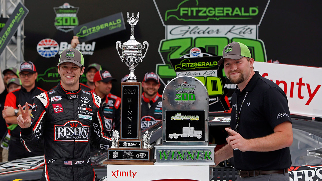 Driver-Erik-Jones,-left,-accepts-the-trophy-from-Tommy-Fitzgerald-Jr.-after-winning-the-NASCAR-Xfinity-Series-auto-race-on-Saturday,-April-22,-2017-in-Bristol,-Tenn.-(Wade-Payne/AP)