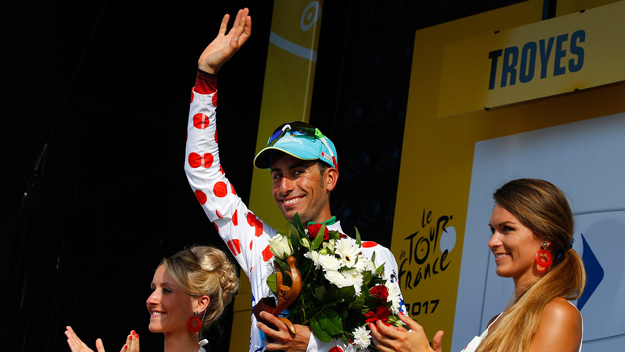 Italy's-Fabio-Aru,-wearing-the-best-climber's-dotted-jersey,-celebrates-on-the-podium-after-the-sixth-stage-of-the-Tour-de-France-cycling-race-over-216-kilometers-(134-miles)-with-start-in-Vesoul-and-finish-in-Troyes,-France,-Thursday,-July-6,-2017.-(Peter-Dejong/AP)