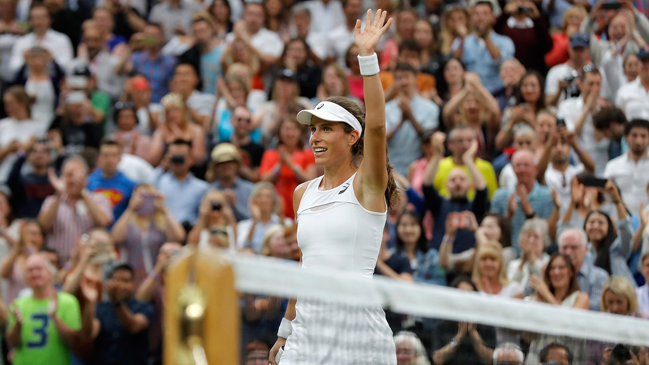 Britain's-Johanna-Konta-celebrates-after-beating-Romania's-Simona-Halep-at-the-end-of-their-Women's-Quarterfinal-Singles-Match-on-day-eight-at-the-Wimbledon-Tennis-Championships-in-London-Tuesday,-July-11,-2017.-(Alastair-Grant/AP)