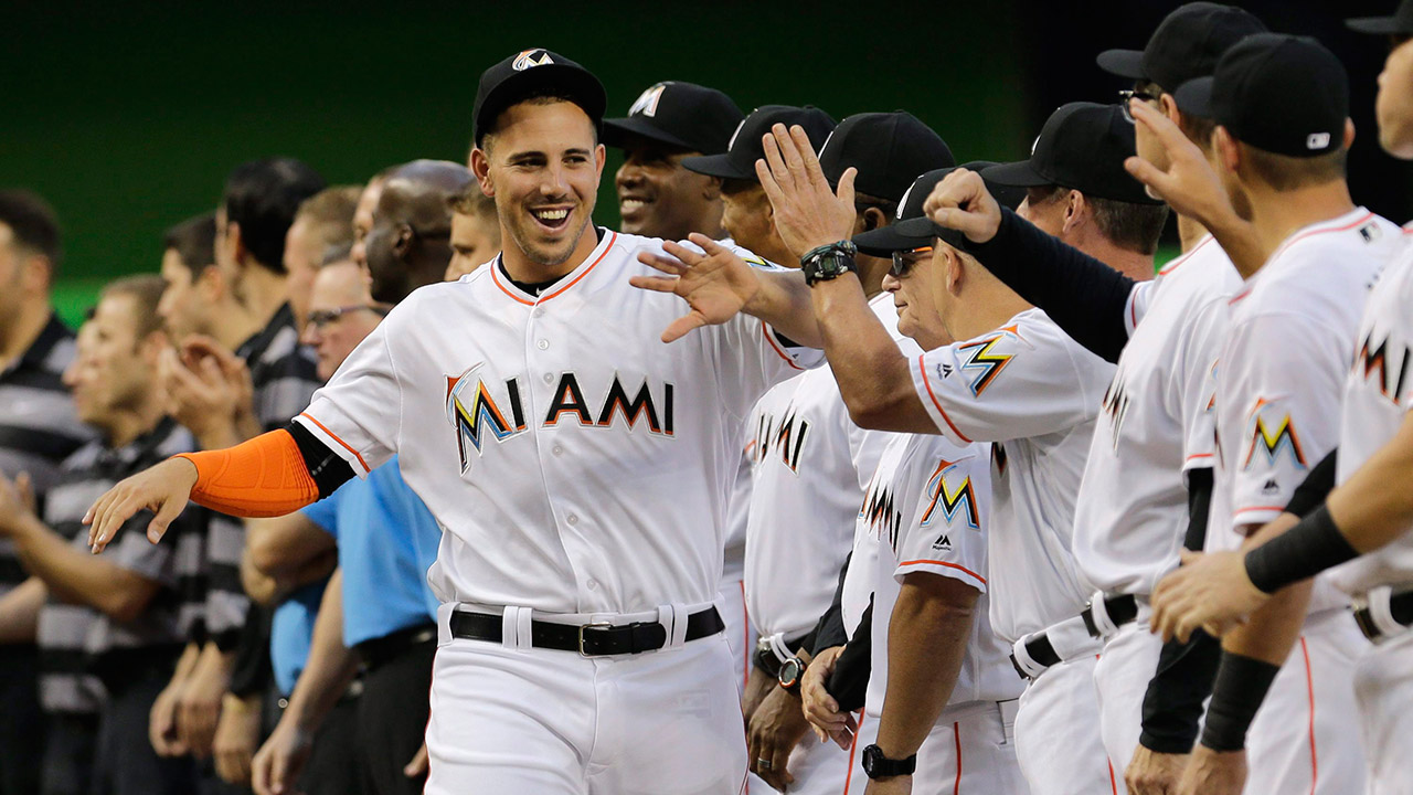 Miami-Marlins-starting-pitcher-Jose-Fernandez-greets-his-teammates-during-a-ceremony-before-an-interleague-opening-day-baseball-game-between-the-Miami-Marlins-and-the-Detroit-Tigers,-in-Miami.-The-Miami-Marlins-begin-their-25th-season-without-their-late-ace,-his-legacy-badly-tarnished-by-recently-disclosed-details-of-his-death,-which-somehow-makes-the-shadow-over-the-franchise-even-darker.-(Alan-Diaz/AP)