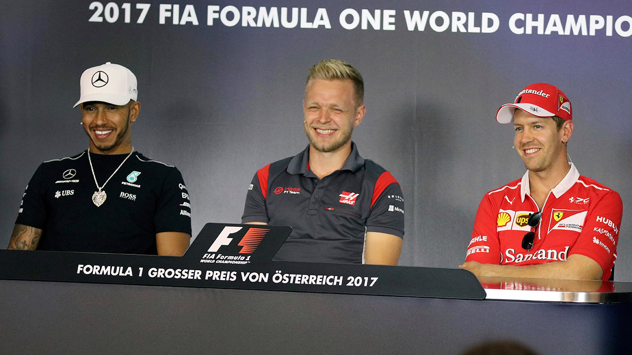 Mercedes-driver-Lewis-Hamilton-of-Britain,-Haas-driver-Kevin-Magnussen-of-Denmark-and-Ferrari-driver-Sebastian-Vettel-of-Germany,-from-left,-speake-during-a-press-conference-prior-to-the-Formula-One-Grand-Prix-at-the-Red-Bull-Ring-in-Spielberg,-Austria,-Thursday,-July-6,-2017.-The-Formula-One-race-will-be-held-on-Sunday.-(Ronald-Zak/AP)