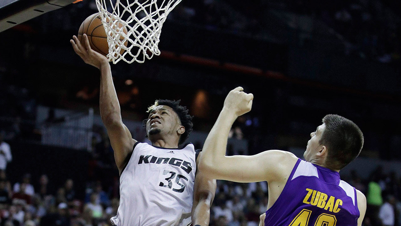 Sacramento-Kings'-Luis-Montero-shoots-around-Los-Angeles-Lakers'-Ivica-Zubac.-(John-Locher/AP)