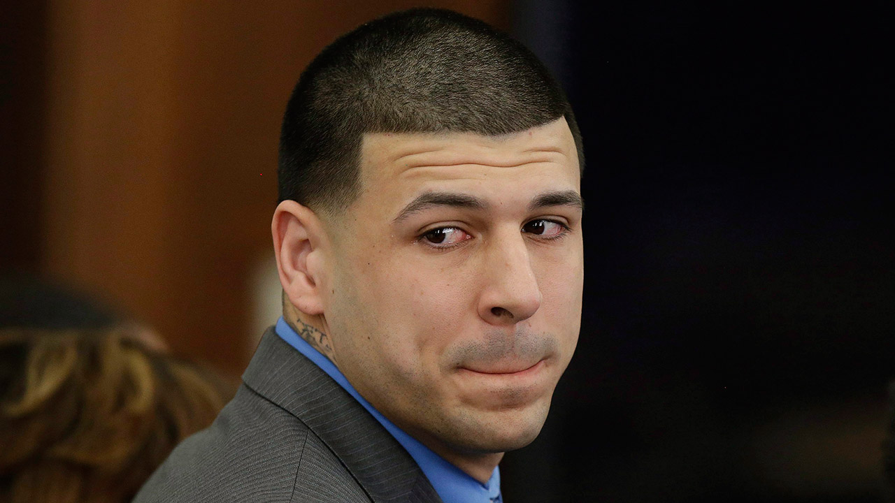 New-England-Patriots-tight-end-Aaron-Hernandez-turns-to-look-in-the-direction-of-the-jury-as-he-reacts-to-his-double-murder-acquittal-after-the-sixth-day-of-jury-deliberations-at-Suffolk-Superior-Court-in-Boston.-Massachusetts-prosecutors-on-Friday,-June-23,-2017,-appealed-a-court-ruling-that-erased-the-former-NFL-star's-murder-conviction-in-the-2013-killing-of-a-semi-professional-football-player.-Hernandez's-conviction-inwas-voided-after-he-killed-himself-in-prison.-Under-a-long-held-Massachusetts-legal-principle,-courts-typically-erase-the-convictions-of-defendants-who-die-before-their-direct-appeals-can-be-heard.-(Stephan-Savoia/AP)