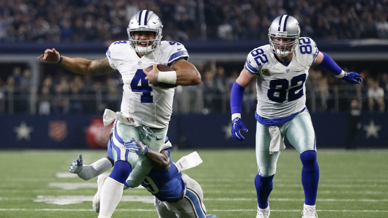 Detroit-Lions'-Johnson-Bademosi,-brings-down-Dallas-Cowboys'-Dak-Prescott-(4)-after-a-short-run-as-tight-end-Jason-Witten-watches-in-the-second-half-of-an-NFL-football-game,-Monday,-Dec.-26,-2016,-in-Arlington,-Texas.-(Brandon-Wade/AP)