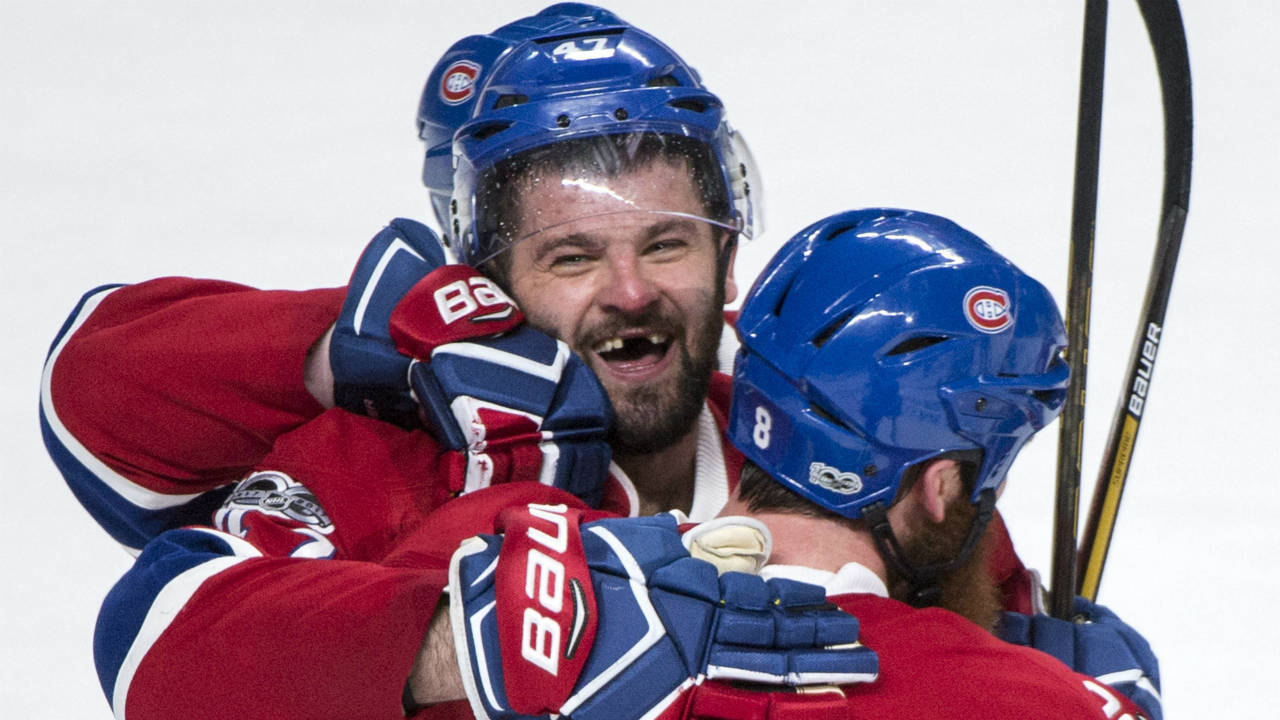 Montreal-Canadiens'-Alexander-Radulov,-left,-celebrates-his-winning-goal-against-the-New-York-Rangers-with-teammate-Jordie-Benn-during-overtime-in-Game-2-NHL-Stanley-Cup-first-round-playoff-hockey-game-action-Friday,-April-14,-2017,-in-Montreal.-(Paul-Chiasson/The-Canadian-Press-via-AP)