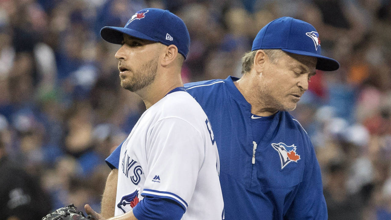 Manager-John-Gibbons-pulls-Toronto-Blue-Jays-starting-pitcher-Marco-Estrada-out-of-the-game-during-fifth-inning-AL-baseball-action-against-the-Boston-Red-Sox,-in-Toronto-on-Friday,-June-30,-2017.-(Fred-Thornhill/CP)