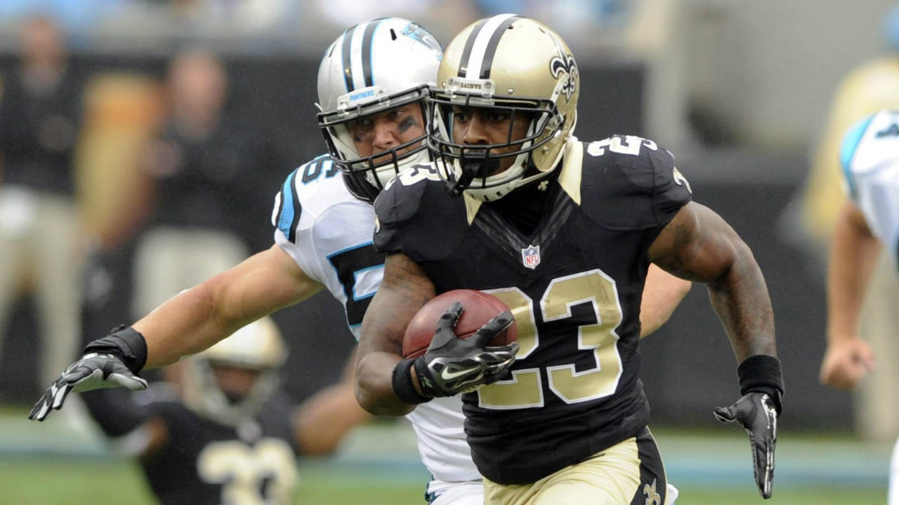 New-Orleans-Saints'-Marcus-Murphy-(23)-returns-a-punt-for-a-touchdown-against-the-Carolina-Panthers-during-the-second-half-of-an-NFL-football-game-in-Charlotte,-N.C.,-Sunday,-Sept.-27,-2015.-(Mike-McCarn/AP)