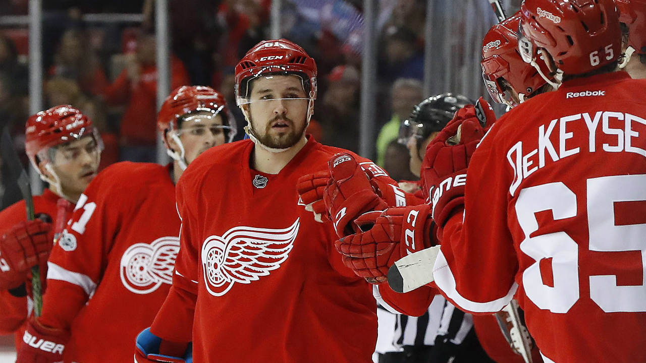 Detroit-Red-Wings-defenceman-Xavier-Ouellet-(61)-celebrates-his-goal-against-the-Chicago-Blackhawks-in-the-first-period-of-an-NHL-hockey-game-Friday,-March-10,-2017,-in-Detroit.-(Paul-Sancya/AP)