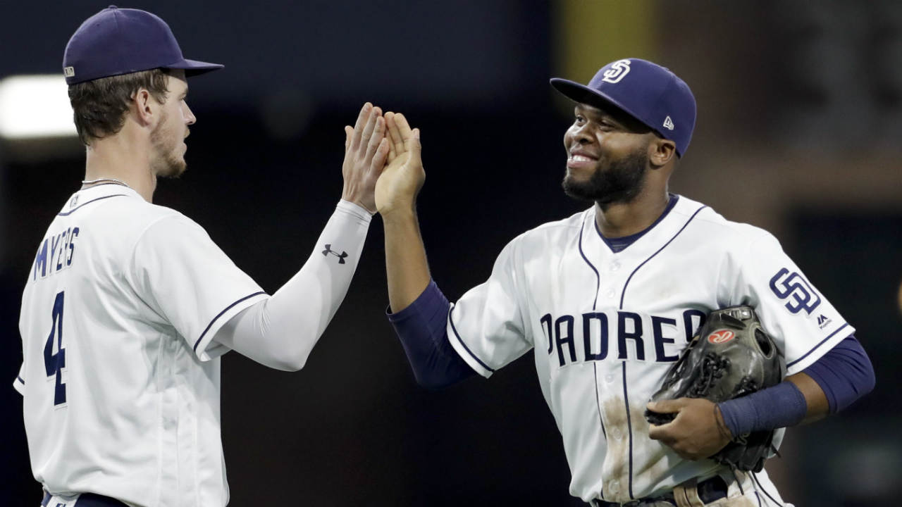 San-Diego-Padres-centre-fielder-Manuel-Margot,-right,-celebrates-with-first-baseman-Wil-Myers-after-the-Padres-defeated-the-New-York-Mets-7-5-in-a-baseball-game-Thursday,-July-27,-2017,-in-San-Diego.-(Gregory-Bull/AP)
