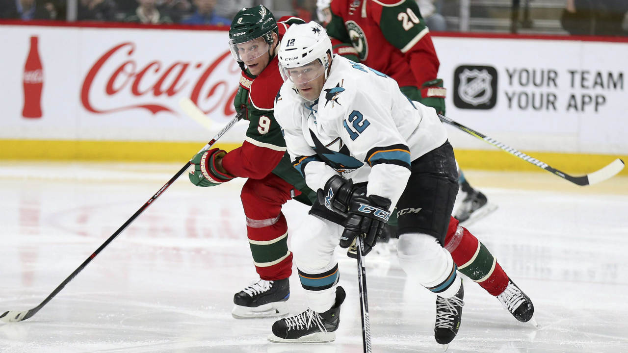 San-Jose-Sharks'-Patrick-Marleau-(12)-gains-control-of-the-puck-against-Minnesota-Wild's-Mikko-Koivu-(9)-in-the-third-period-of-an-NHL-hockey-game-Tuesday,-March-21,-2017,-in-St.-Paul,-Minn.-The-Wild-won-3-2.-(Stacy-Bengs/AP)