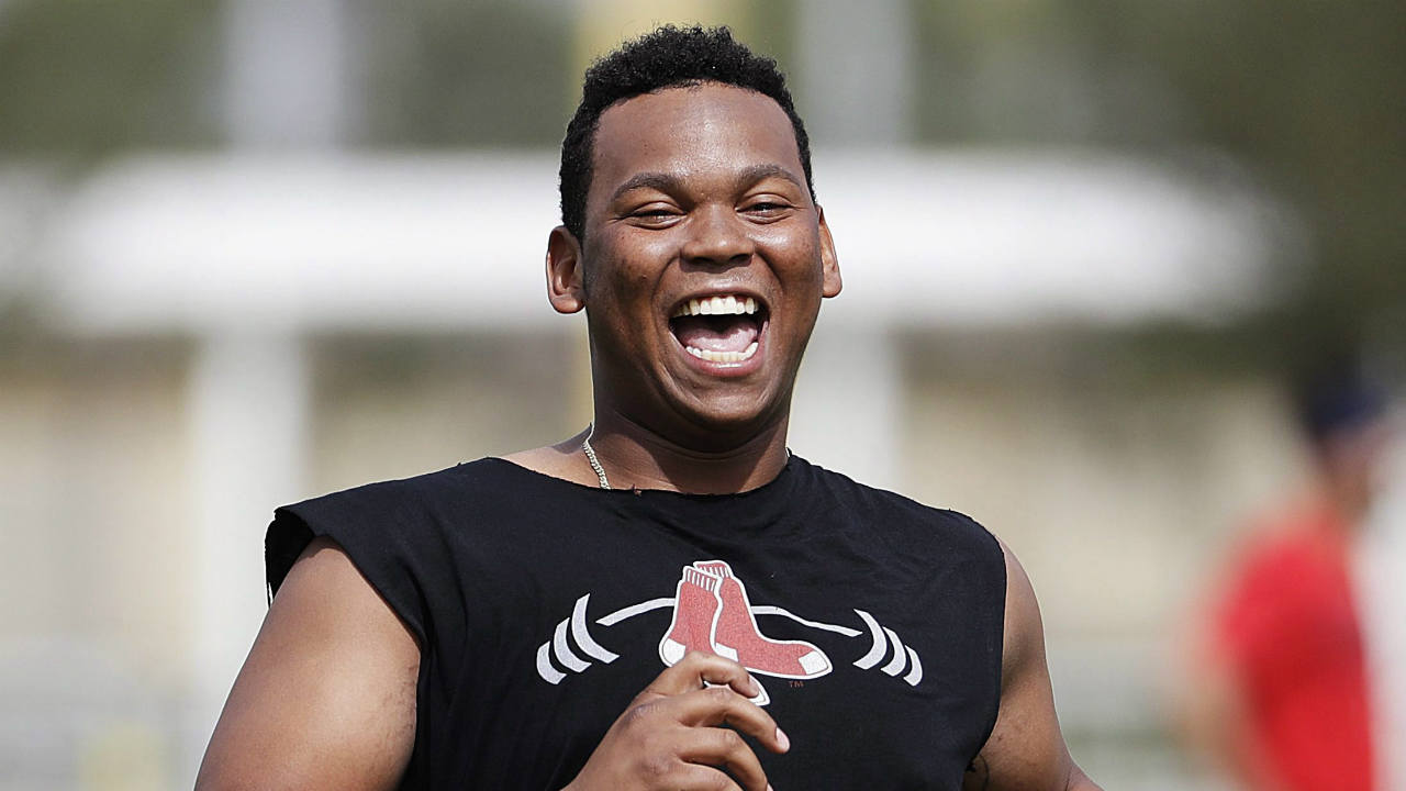 Boston-Red-Sox's-Rafael-Devers-runs-a-drill-during-baseball-spring-training-in-Fort-Myers,-Fla.,-Monday,-Feb.-13,-2017.-(David-Goldman/AP)