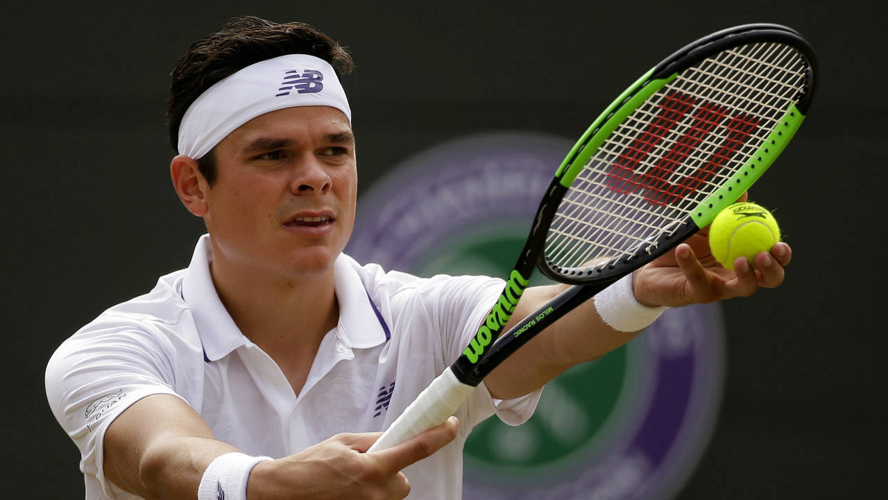 Canada's-Milos-Raonic-prepares-to-serve-to-Spain's-Albert-Ramos-Vinolas-during-their-Men's-singles-match-on-day-six-at-the-Wimbledon-Tennis-Championships-in-London-Saturday,-July-8,-2017.-(Alastair-Grant/AP)