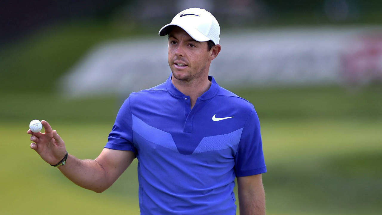 Rory-McIlroy-waves-after-birdieing-the-15th-hole-during-the-final-round-of-play-at-the-Travelers-Championship-golf-tournament-Sunday,-June-25,-2017,-in-Cromwell,-Conn.-(Brad-Horrigan/Hartford-Courant-via-AP)