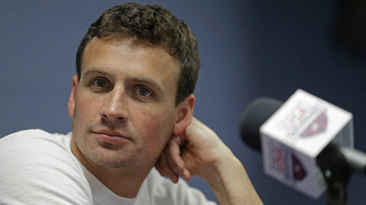 In-this-May-12,-2016,-file-photo,-Ryan-Lochte-listens-to-a-question-from-the-media-in-Charlotte,-N.C.-Lochte-shared-a-photo-of-his-newborn-son-June-14,-2016-on-Instagram.-(Chuck-Burton,-File/AP)