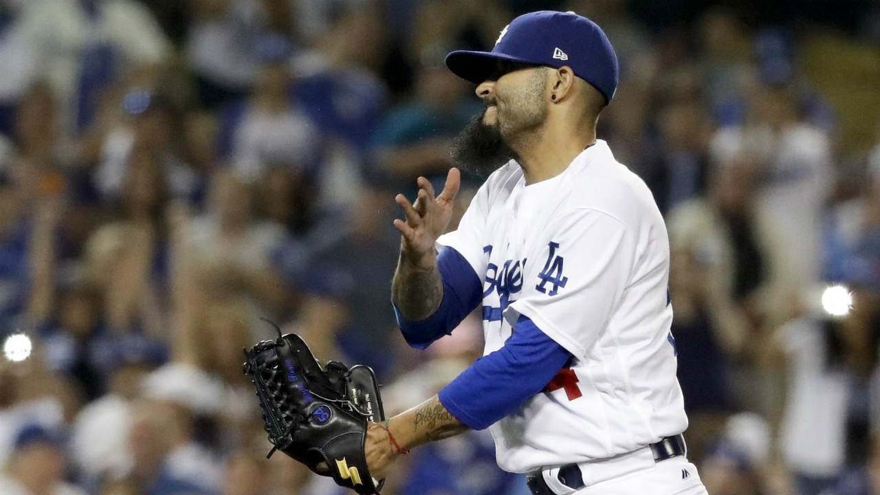 Los-Angeles-Dodgers-pitcher-Sergio-Romo-celebrates-after-their-4-0-win-against-the-Colorado-Rockies-in-a-baseball-game-in-Los-Angeles,-Saturday,-June-24,-2017.-(Chris-Carlson/AP)