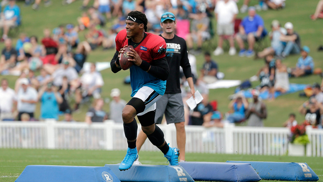 Carolina-Panthers'-Cam-Newton-runs-a-drill-during-practice.-(Chuck-Burton/AP)
