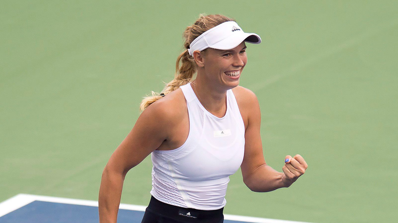Caroline-Wozniacki-of-Denmark-celebrates-after-defeating-Karolina-Pliskova.-(Frank-Gunn/CP)