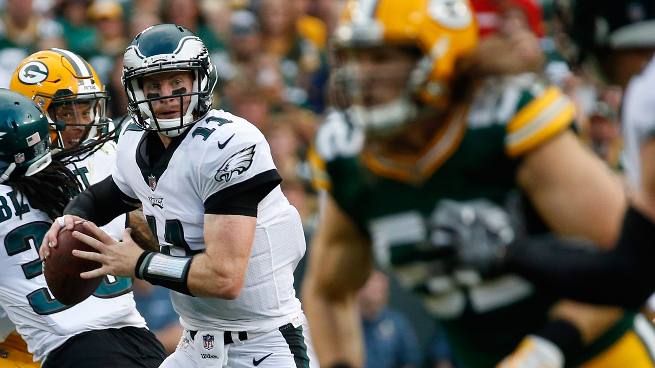 Philadelphia-Eagles'-Carson-Wentz-throws-during-the-first-half.-(Mike-Roemer/AP)