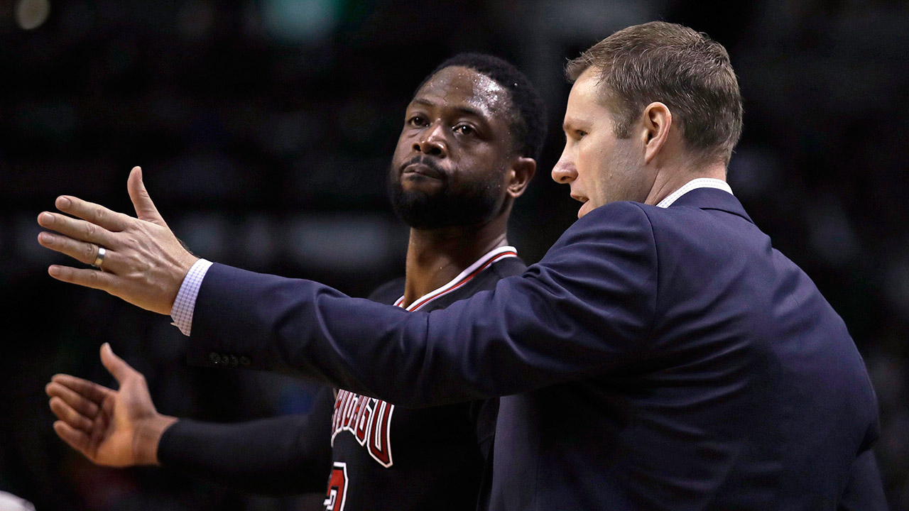 Chicago-Bulls-head-coach-Fred-Hoiberg-talks-with-guard-Dwyane-Wade.-(Charles-Krupa/AP)