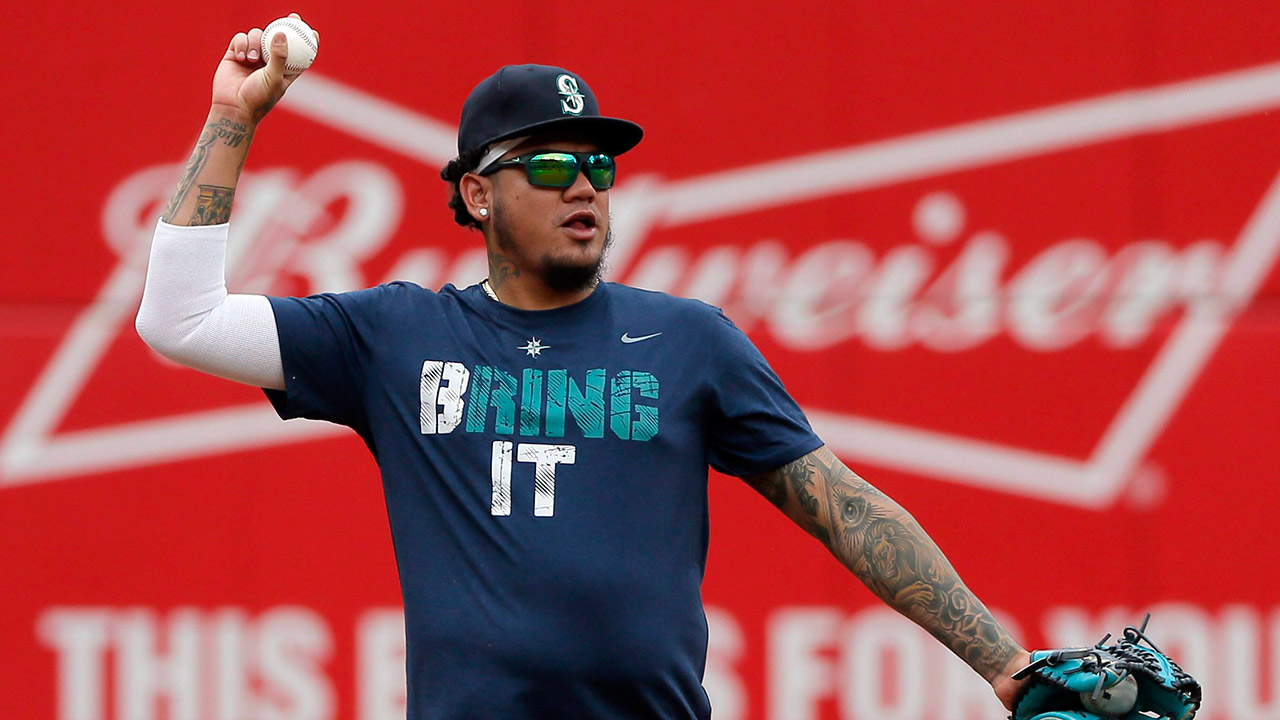 Seattle-Mariners'-Felix-Hernandez-tosses-a-ball-from-the-infield.-(Tony-Gutierrez/AP)