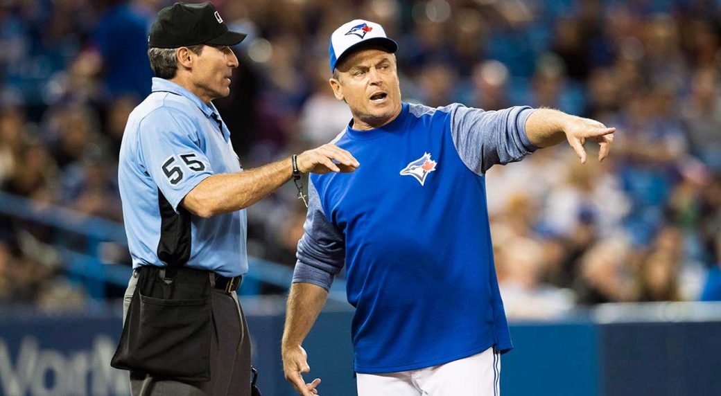 MLB umpires wear white wristbands to protest verbal attacks