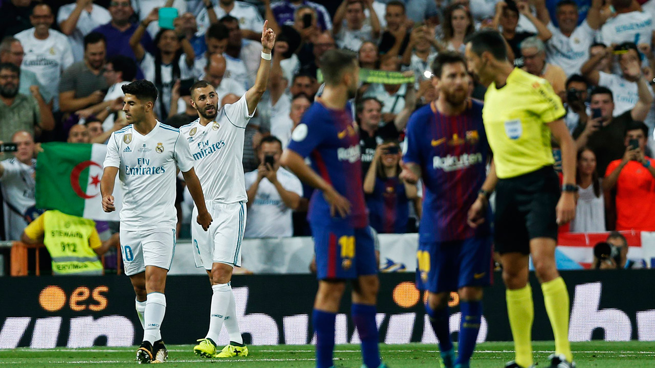 Real-Madrid's-Karim-Benzema-celebrates-after-scoring-his-side's-second-goal.-(Francisco-Seco/AP)