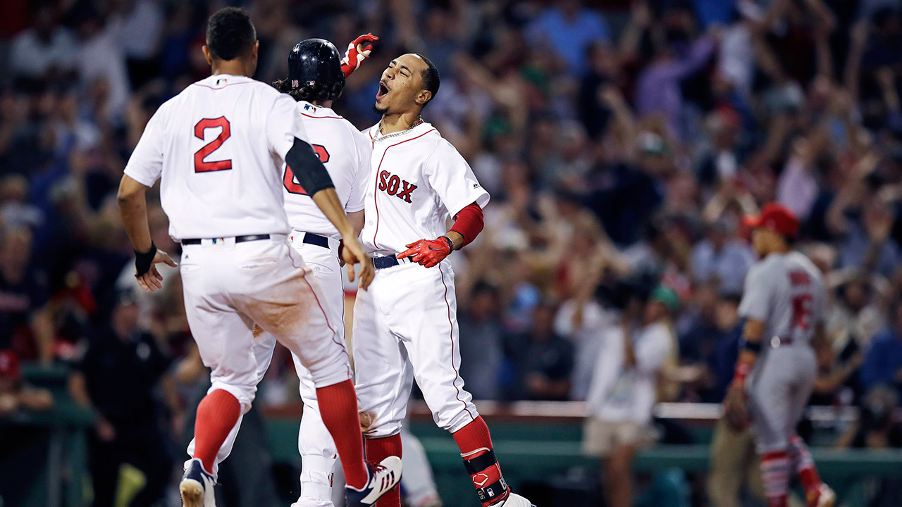 Boston-Red-Sox's-Mookie-Betts-celebrates-after-his-walk-off-two-RBI-double.-(Charles-Krupa/AP)