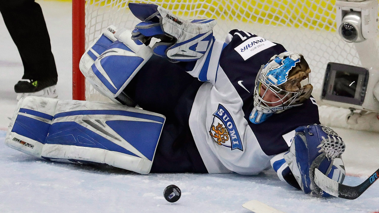 Finland-goalie-Noora-Raty-deflects-a-shot-during-the-first-period.-(Carlos-Osorio/AP)