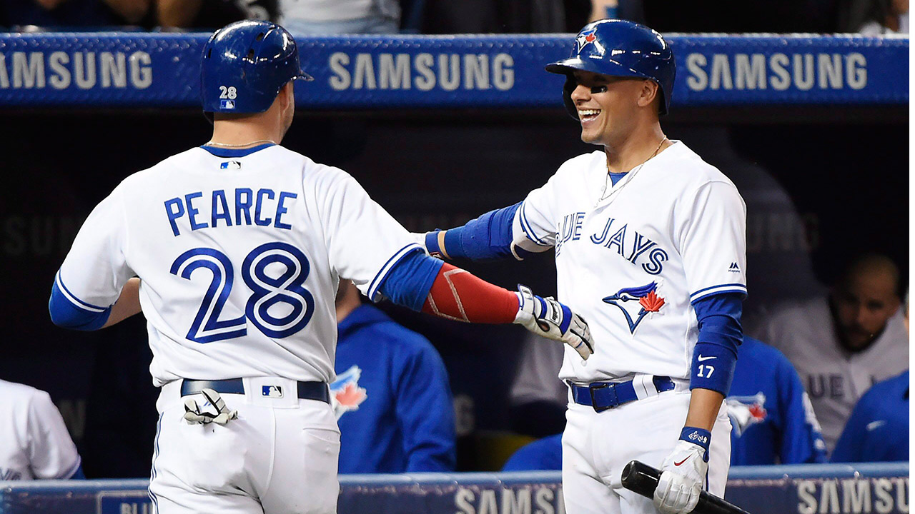 Toronto-Blue-Jays-left-fielder-Steve-Pearce-celebrates-his-solo-home-run.-(Nathan-Denette/CP)