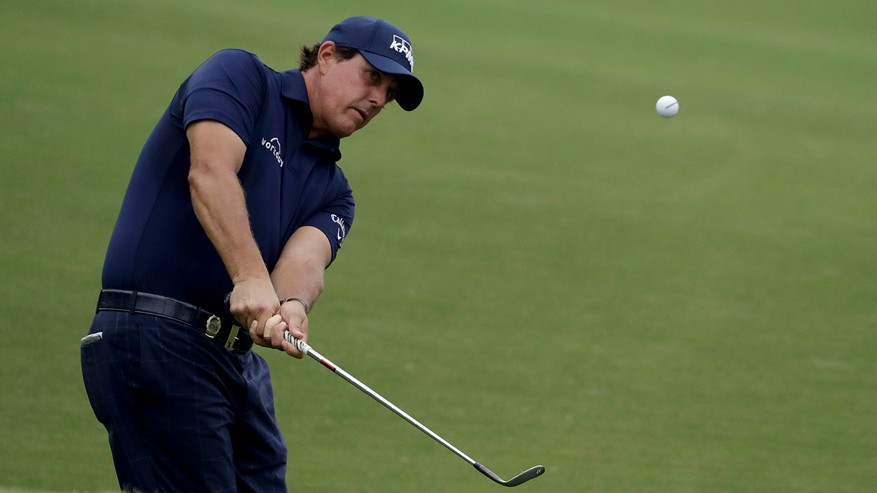 Phil-Mickelson-chips-to-the-14th-green-during-the-second-round-of-the-PGA-Championship.-(Chris-O'Meara/AP)