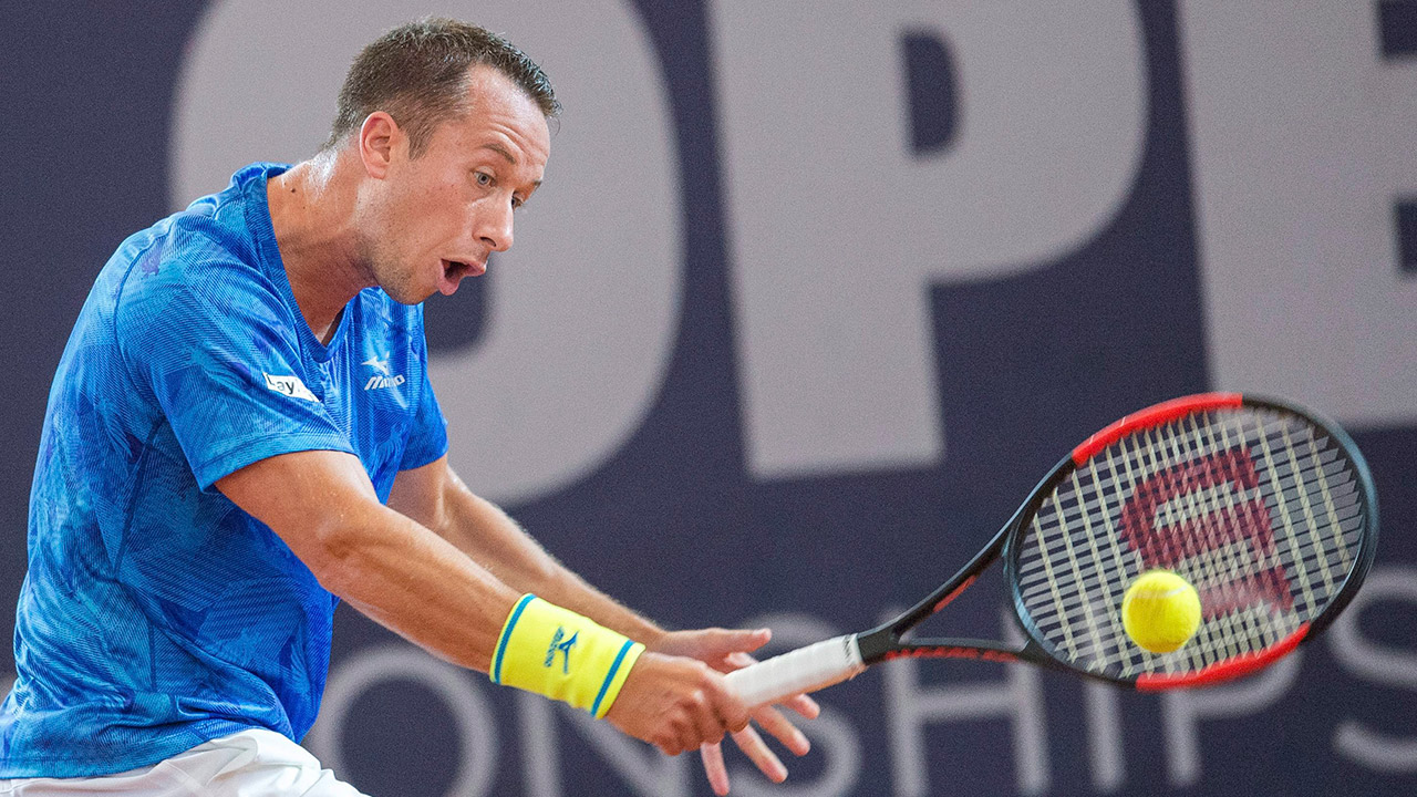 Germany's-Philipp-Kohlschreiber-returns-a-shot-to-Germany's-Florian-Mayer.-(Daniel-Bockwoldt/AP)