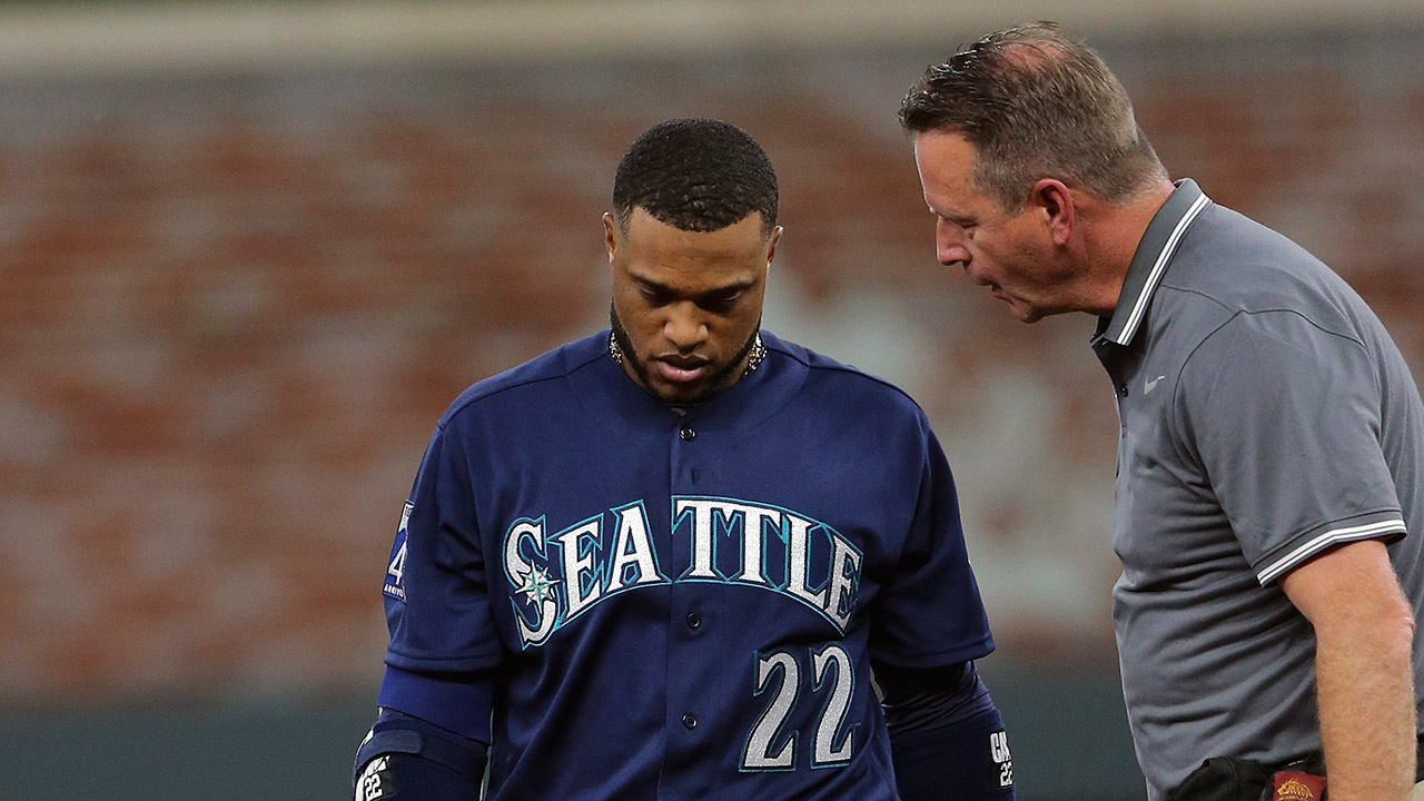 Robinson-Cano-has-left-Seattle's-game-against-the-Atlanta-Braves-with-tightness-in-his-left-hamstring.-(John-Bazemore/AP)